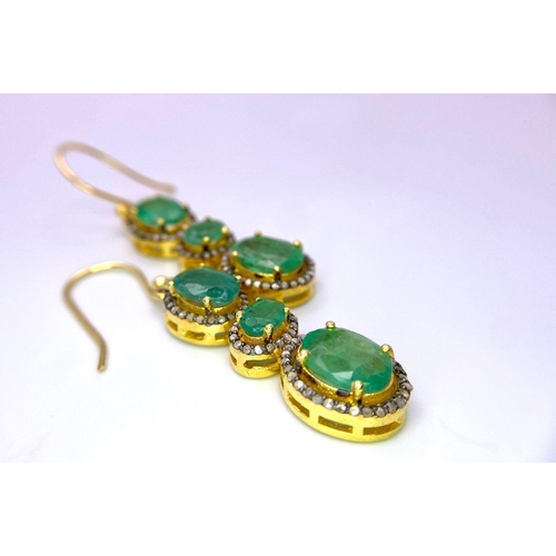 377 - A Pair of Emerald Gemstone Drop Earrings. Each emerald having a halo of Diamonds. Emeralds - 10ctw a... 