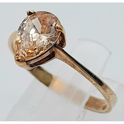 489 - A 9K Yellow Gold CZ Solitaire Ring with tear drop fancy yellow stone. 
Size: O
Weight: 1.88g