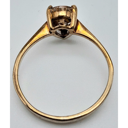 489 - A 9K Yellow Gold CZ Solitaire Ring with tear drop fancy yellow stone. 
Size: O
Weight: 1.88g