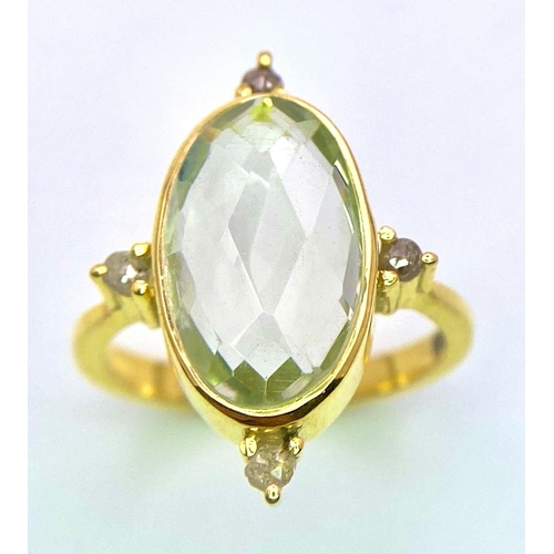 705 - An Oval Green Amethyst and Diamond Ring. Central faceted stone with diamond compass points set in gi... 