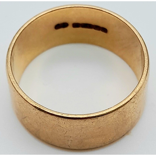 74 - A Vintage 9K Yellow Gold Wide Band Ring. Full UK hallmarks.
Size V/W. 1cm wide. 7.88g