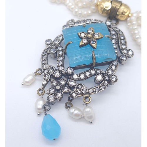 767 - A Vintage Chalcedony and Four Strand Seed Pearl Necklace. With an art deco style drop pendant. Neckl... 