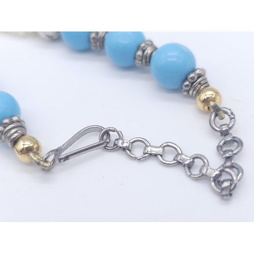 767 - A Vintage Chalcedony and Four Strand Seed Pearl Necklace. With an art deco style drop pendant. Neckl... 