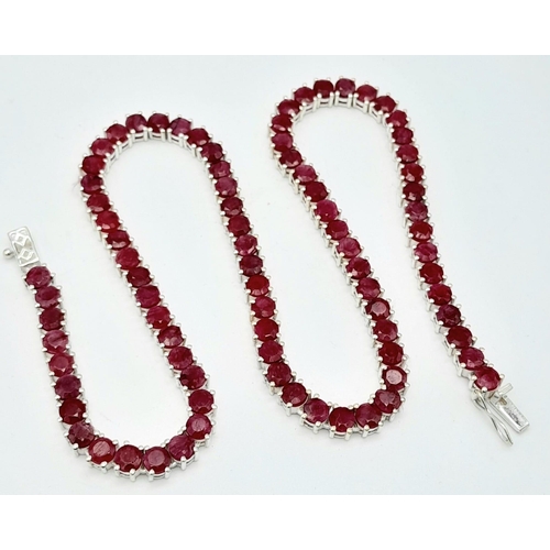 808 - A Round-Cut Ruby Gemstone Tennis Necklace set in 925 Silver. 45cm length. 43.5g total weight. Ref: C... 