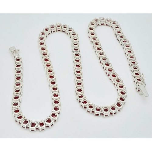 808 - A Round-Cut Ruby Gemstone Tennis Necklace set in 925 Silver. 45cm length. 43.5g total weight. Ref: C... 