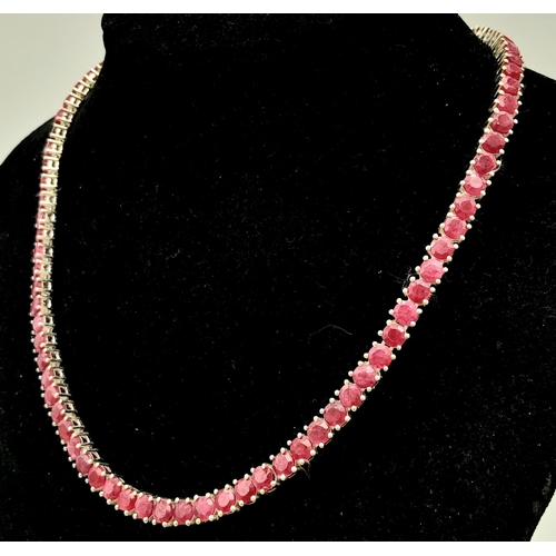 808 - A Round-Cut Ruby Gemstone Tennis Necklace set in 925 Silver. 45cm length. 43.5g total weight. Ref: C... 