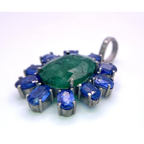 817 - A New-Age Style Emerald and Kyanite Pendant with Diamond accents. Emerald - 8.10ctw. Kyanite - 5.50c... 