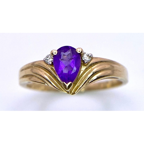 842 - A Vintage 9K Yellow Gold Amethyst and Diamond Ring. Small teardrop amethyst with diamond accents. Si... 