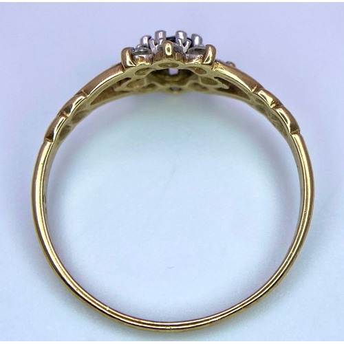 874 - A Vintage 9K Yellow Gold, Sapphire and CZ Ring. Small central sapphire with a CZ halo. Size M/N. 1.2... 