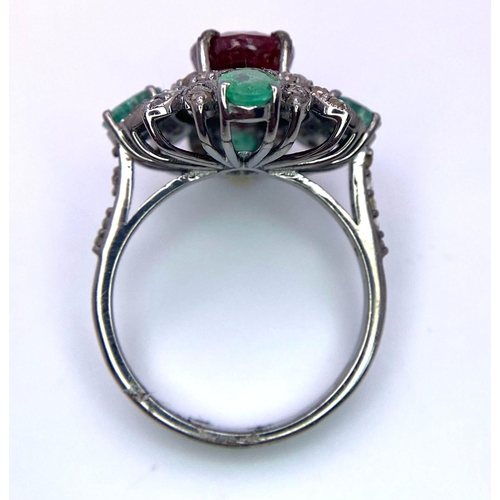 932 - An Art Deco Style 3.30ct Ruby Ring with 1.10ctw of Emeralds and 0.70ctw of Diamond Accents. Set in 9... 