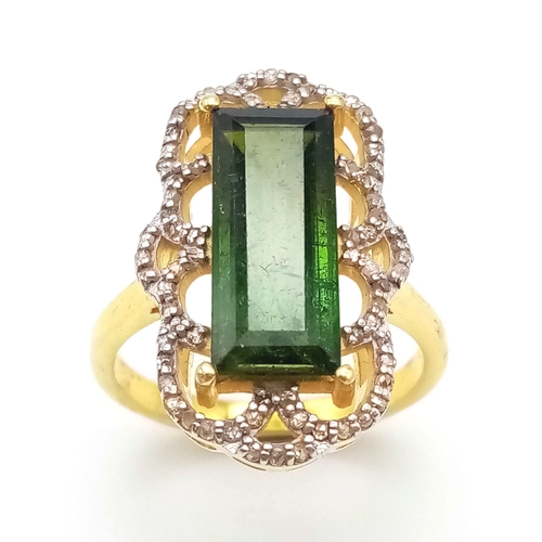 1521 - A Green Tourmaline Gemstone Ring with a Decorative Diamond Surround. Set in gilded 925 silver. Tourm... 