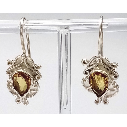 1632 - An Antique Style Pair of Citrine and 925 Silver Drop Earrings. Citrines - 9ct. 6.20g total weight. C... 