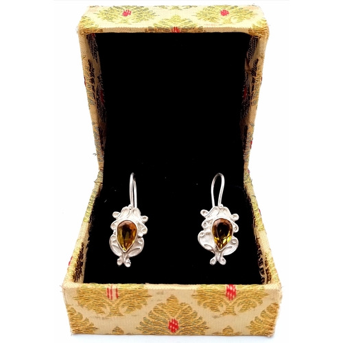 1632 - An Antique Style Pair of Citrine and 925 Silver Drop Earrings. Citrines - 9ct. 6.20g total weight. C... 