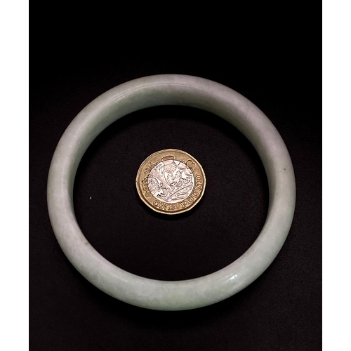 1522 - A Cauliflower Coloured Jade Bangle - In Box.