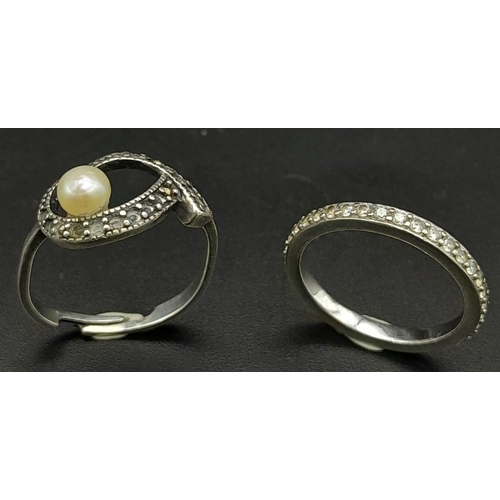 1529 - Pair of Sterling Silver Rings.
A sparkly, Diamonique Cubic Zirconia, Size: K and a vintage Cultured ... 