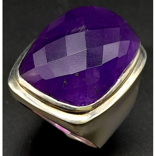 1739 - A Large Faceted Amethyst Gemstone Ring set in 925 Silver. Size Q. 19.1g total weight.