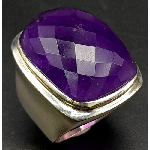 1739 - A Large Faceted Amethyst Gemstone Ring set in 925 Silver. Size Q. 19.1g total weight.