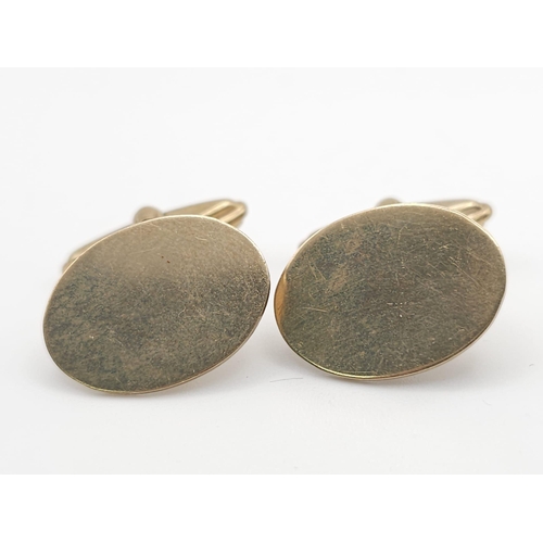 1168 - A 9 K yellow gold pair of cufflinks with an oval plain top plate. Weight: 7.8 g. Can be engraved wit... 