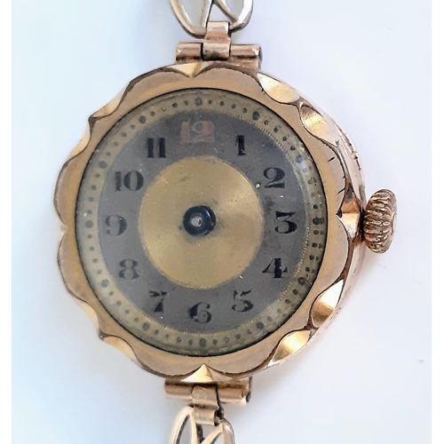 1175 - An Antique 9K Gold Cased Ladies Watch. Rolled gold bracelet 9k gold case. No hands, loose case lid, ... 