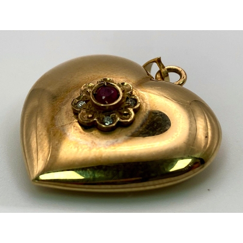 1174 - A 9K Yellow Gold Ruby and Diamond Pendant. Half of the diamonds are missing so a perfect restoration... 