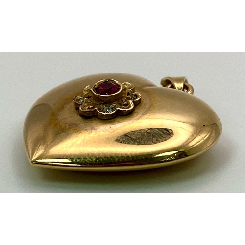 1174 - A 9K Yellow Gold Ruby and Diamond Pendant. Half of the diamonds are missing so a perfect restoration... 