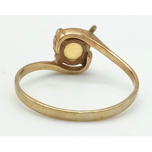 1557 - A Vintage 9K Yellow Gold Citrine Crossover Ring. Size L. 1.11g total weight.