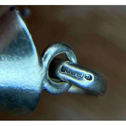 1753 - Two Sterling Silver Charm/Pendants.
Featuring a Martini Glass and an initial 'J'.
Weight: 4.1g