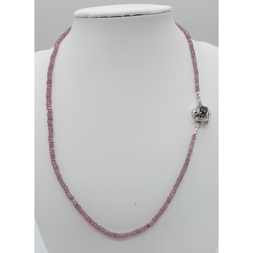 1760 - A Single Strand Pink Sapphire Necklace with Ruby and 925 Silver Clasp. 42cm length.