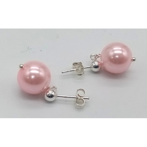 1447 - A Pair of Pink Pearl Shell Earrings on 925 Silver. 18mm length, 3g total weight.