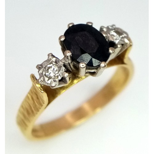 1457 - An 18k yellow gold diamond and sapphire ring. 4.9g total weight. Size Q (sapp:1ct/dia:0.06ct).