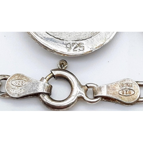 1302 - Collection of Sterling Silver Jewellery.
Featuring an antique locket on chain (50cm), a stunning rin... 