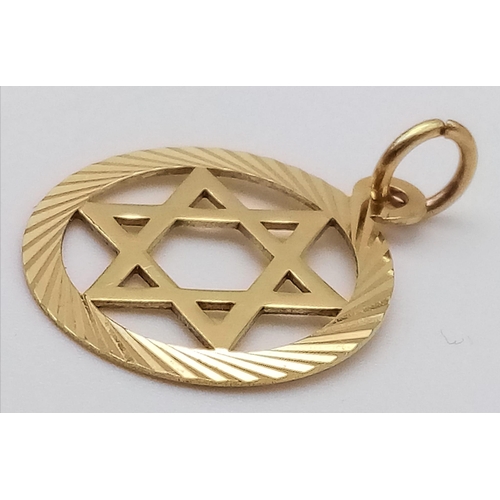 1375 - A 9K Yellow Gold Star of David Pendant. 15mm diameter. 0.7g weight.