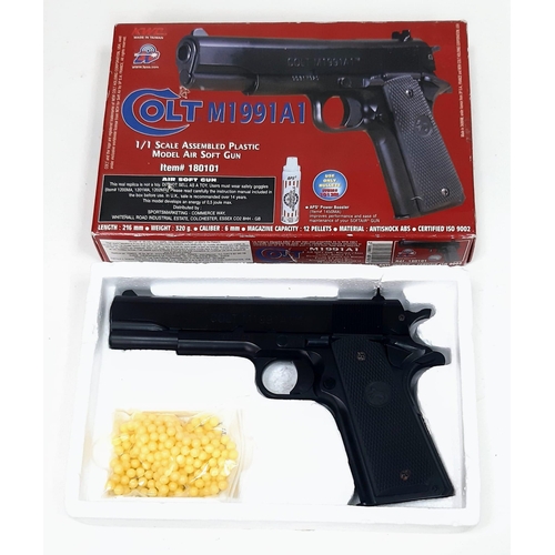 1379 - An Air Soft COLT M1991 A1. 
6mm Caliber, Magazine fill.
Comes with original package and BB pellets i... 