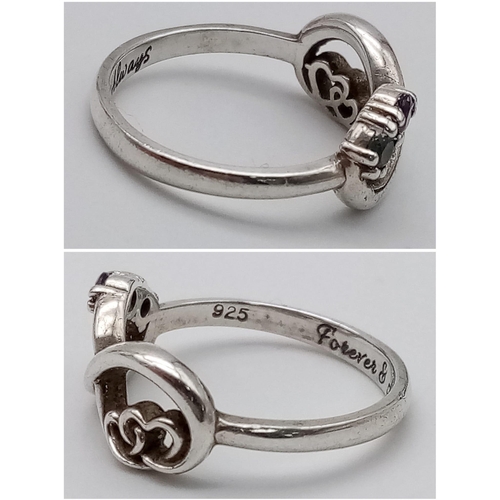 1388 - Two Sterling Silver Rings.
1. 'Forever & Always' engraved, duo stone infinity heart ring. Size: K
2.... 