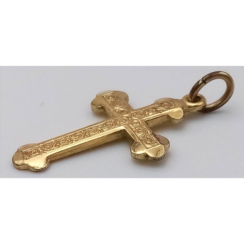 1605 - A Vintage 9K Yellow Gold Cross Pendant/Charm. 2cm. 0.7g weight.