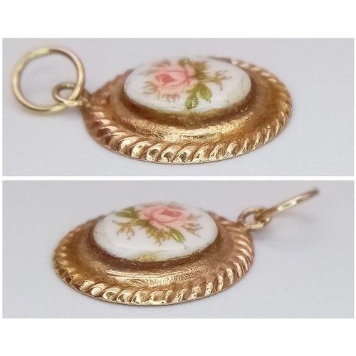 1679 - A Delicate 9K Gold and Floral Enamel Pendant/Charm. 16mm. 0.45g