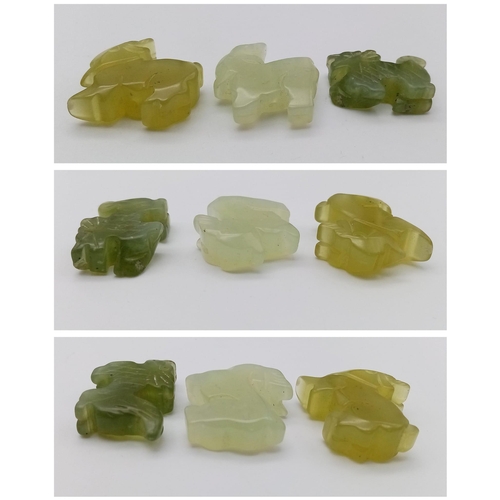 1744 - A trio of Jade Animal Pendants, Each having a hole for threading onto string, Length 3cm.