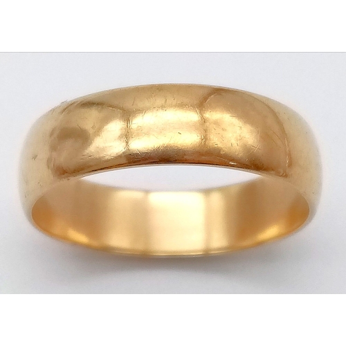 205 - A 9K Yellow Gold Vintage Band Ring. Full UK hallmarks. Size Y. 5.12g weight. 6mm width.