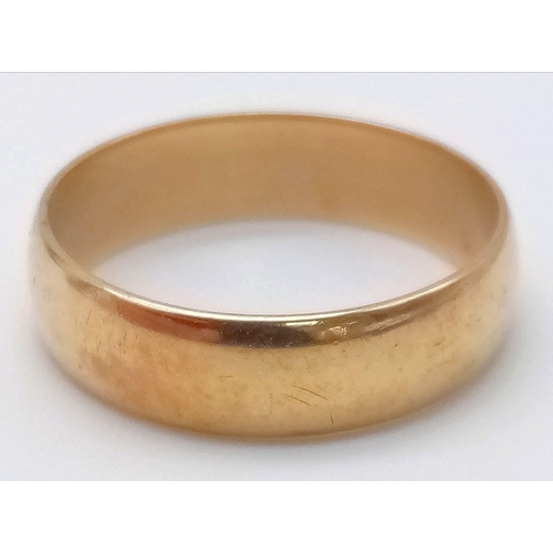 205 - A 9K Yellow Gold Vintage Band Ring. Full UK hallmarks. Size Y. 5.12g weight. 6mm width.