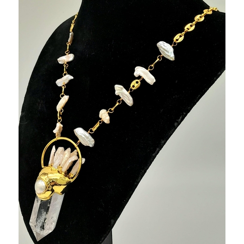 224 - An original designer creation of a necklace with exotic Biwa natural white pearls and a large natura... 