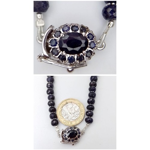 360 - A 275ctw Graduated Blue Sapphire Rondelle Necklace with Sapphire and 925 Silver Clasp. 42cm. 55g tot... 