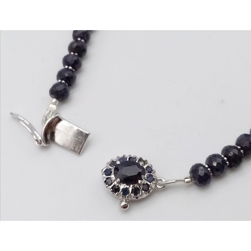 360 - A 275ctw Graduated Blue Sapphire Rondelle Necklace with Sapphire and 925 Silver Clasp. 42cm. 55g tot... 