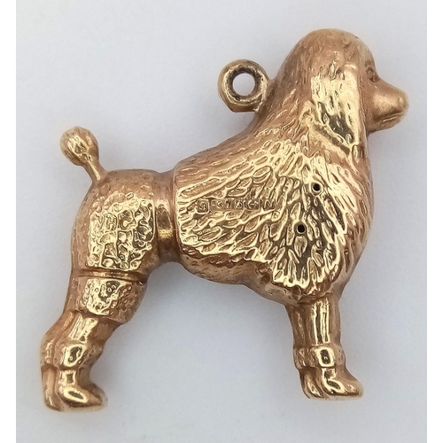 442 - A Vintage 9K Yellow Gold French Poodle Pendant/Charm. 18mm. 0.77g weight