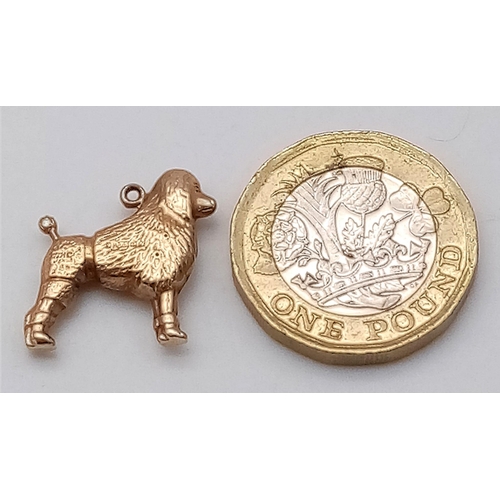 442 - A Vintage 9K Yellow Gold French Poodle Pendant/Charm. 18mm. 0.77g weight