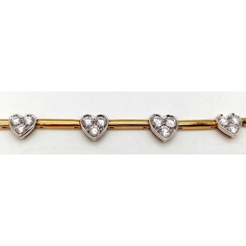 120 - A Gorgeous 18K Gold and Heart-Diamond Necklace and Bracelet Set. The necklace is decorated with grad... 