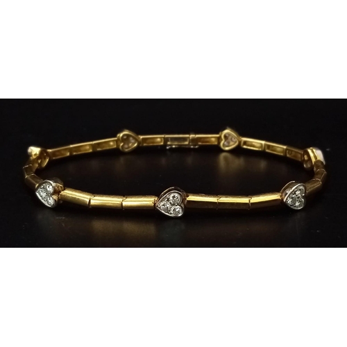 120 - A Gorgeous 18K Gold and Heart-Diamond Necklace and Bracelet Set. The necklace is decorated with grad... 