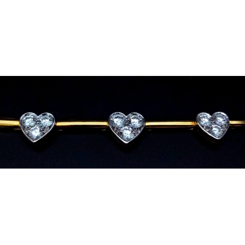 120 - A Gorgeous 18K Gold and Heart-Diamond Necklace and Bracelet Set. The necklace is decorated with grad... 