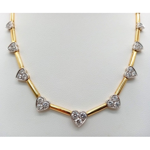 120 - A Gorgeous 18K Gold and Heart-Diamond Necklace and Bracelet Set. The necklace is decorated with grad... 