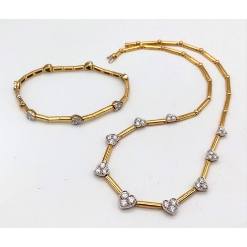 120 - A Gorgeous 18K Gold and Heart-Diamond Necklace and Bracelet Set. The necklace is decorated with grad... 