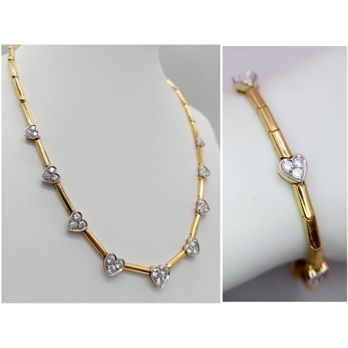 120 - A Gorgeous 18K Gold and Heart-Diamond Necklace and Bracelet Set. The necklace is decorated with grad... 